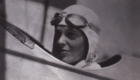 Close up of A.E. with goggles and helmet in Avion - Perdue, Long