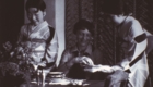 A.E. being served by Chris Holmes, Japanese servants, Waikiki, 1935 - Perdue, Long